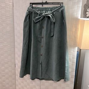 Green Corduroy midi skirt with tie waist and button details and pockets